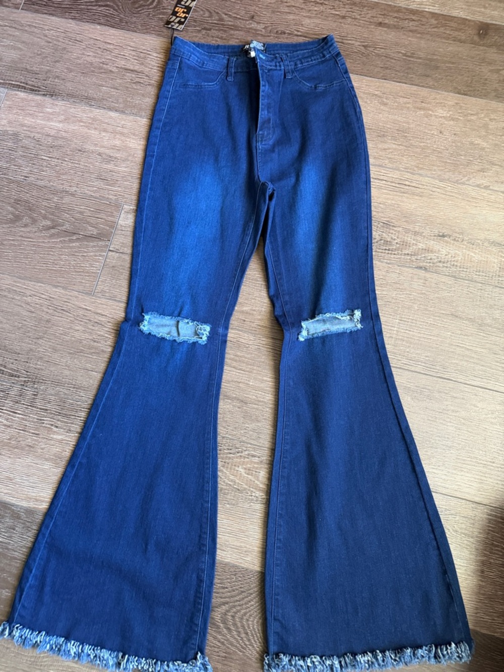 High-Waist Dark Blue Flare Jeans with Distressed Knees
